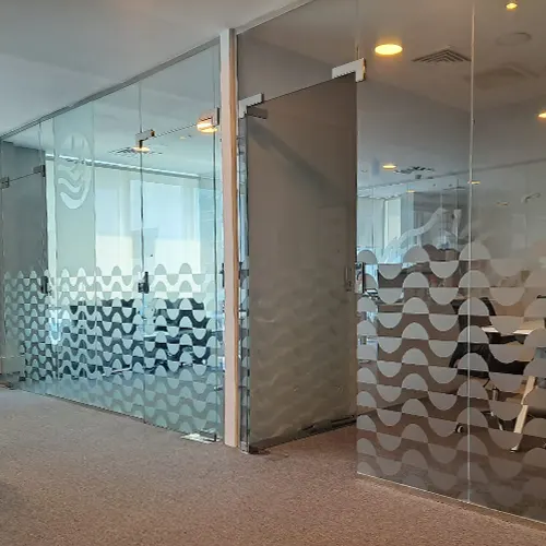 Frosted glass stickers on office glass partition in Abu Dhabi
